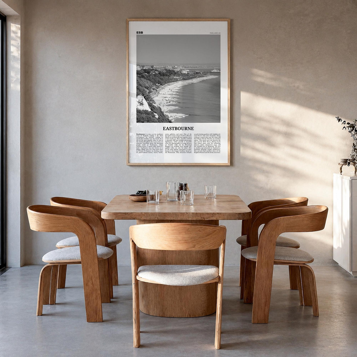 Eastbourne black & white newspaper poster of United Kingdom – vertical wall art in natural wood frame, hanging on wall