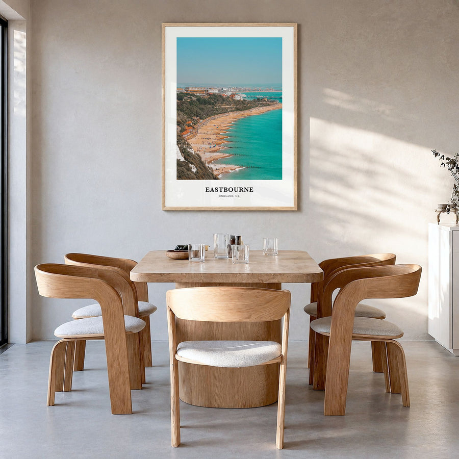 Eastbourne Classic Poster in a natural wood frame, hanging in a dining room