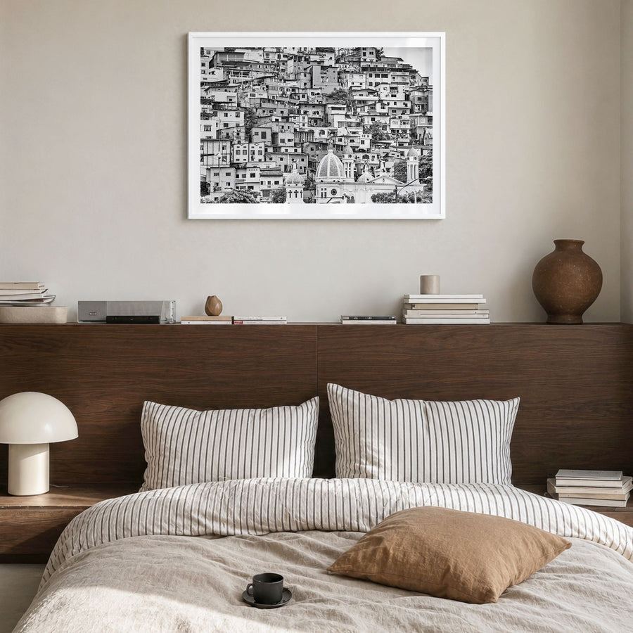 Ecuador Photo Poster in a white wood frame, hanging in a bedroom, white border