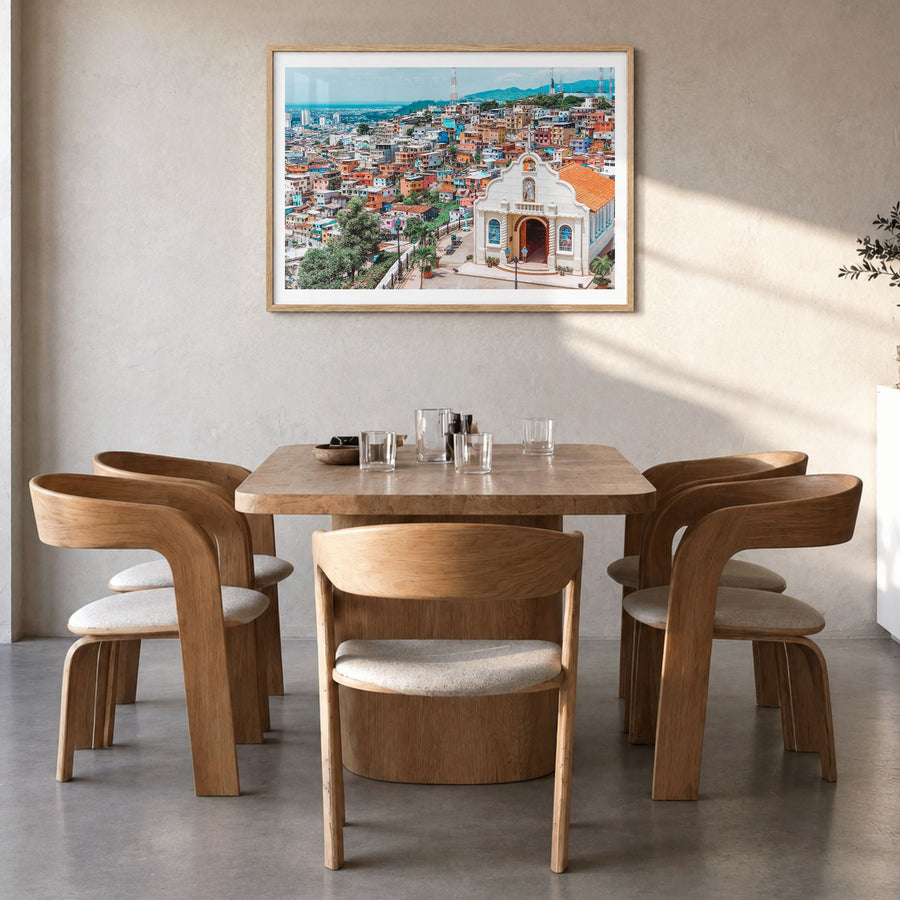 Ecuador Photo Poster in a natural wood frame, hanging in a dining room, white border