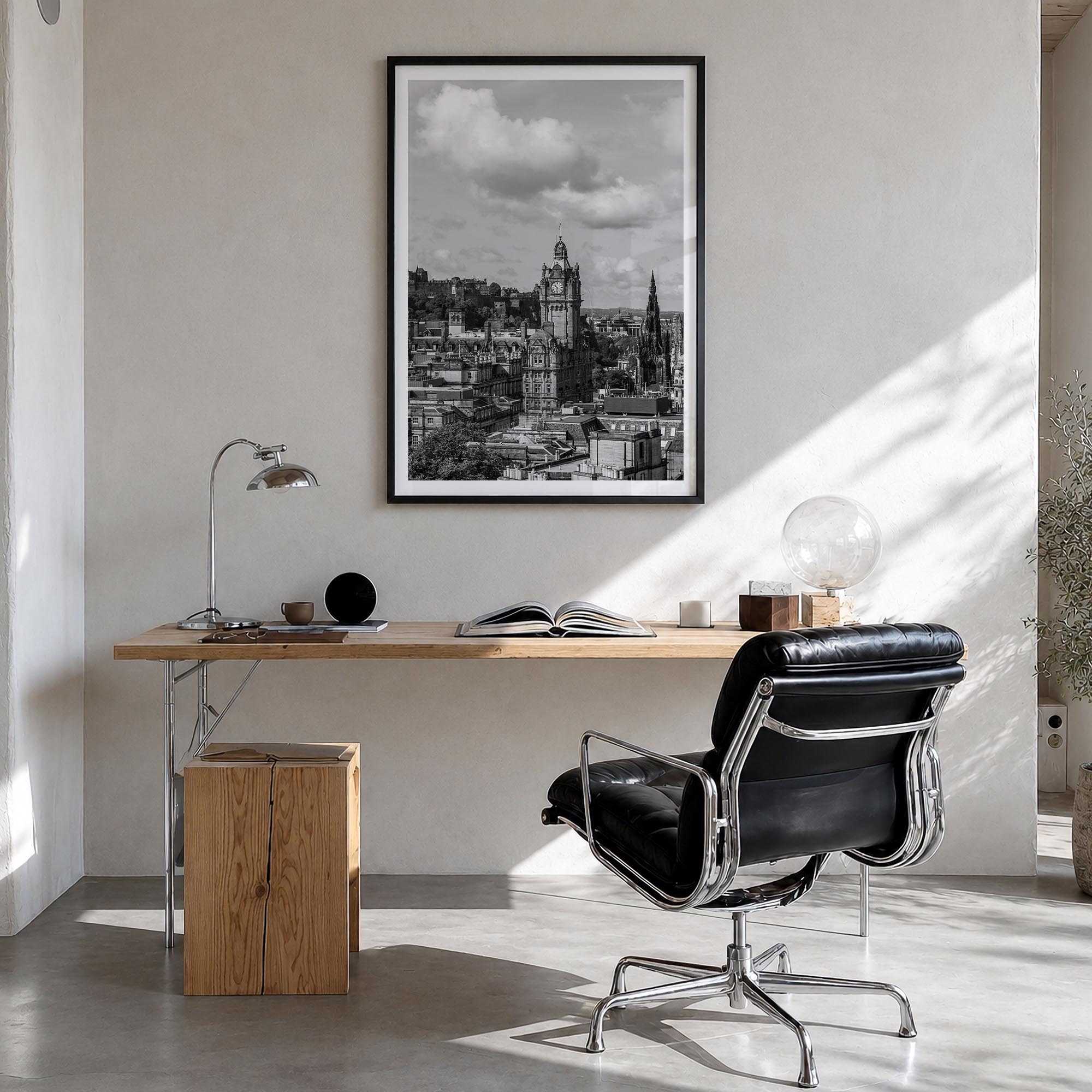 Edinburgh black & white photo poster of Scotland, UK – vertical wall art in black wood frame with white border, hanging on wa