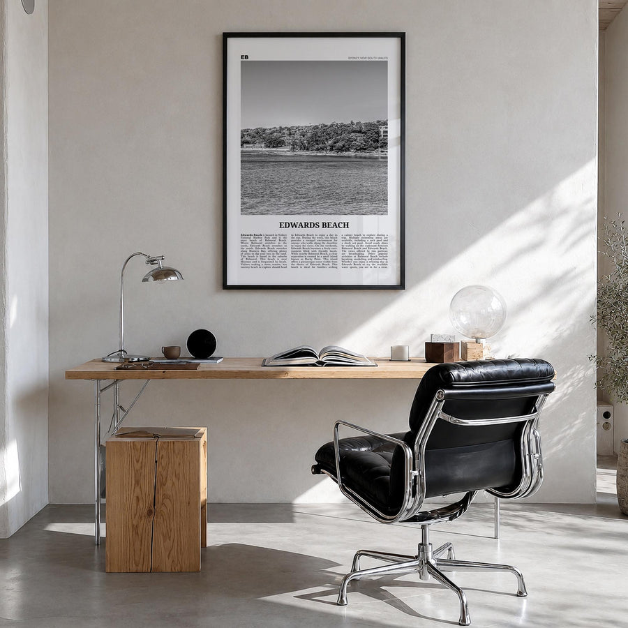 Edwards Beach black & white newspaper poster of Australia – vertical wall art in black wood frame, hanging on wall