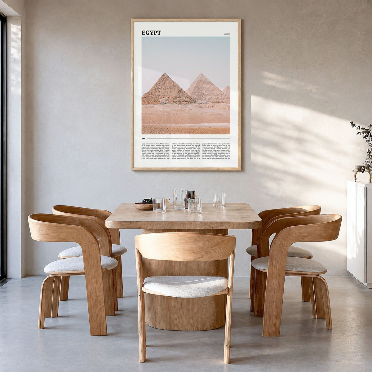 Egypt Travel Poster in a natural wood frame, hanging in a dining room