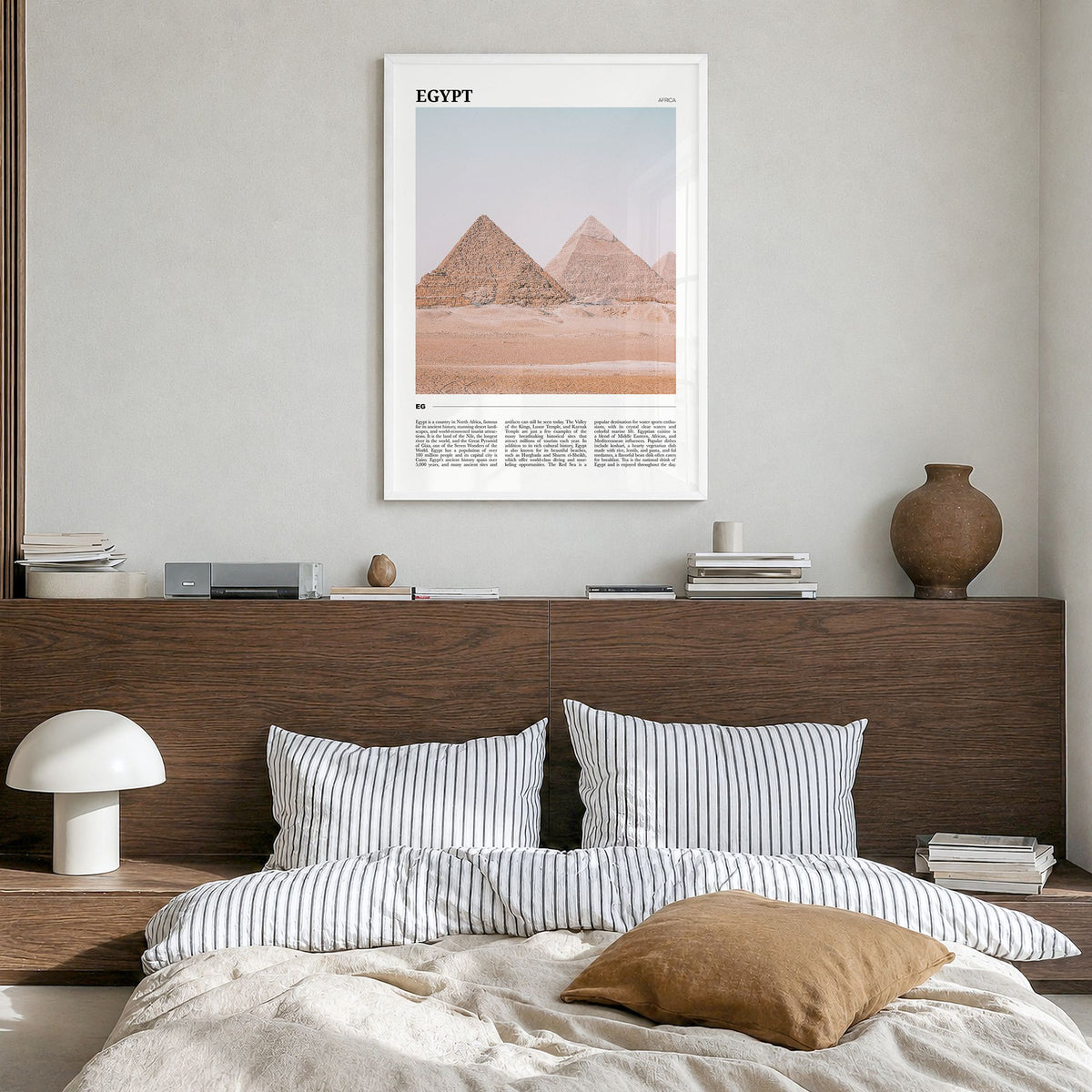 Egypt Travel Poster in a white wood frame, hanging in a bedroom