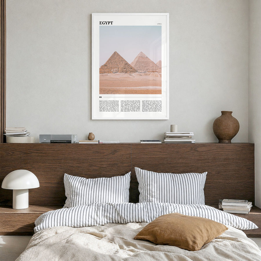 Egypt Travel Poster in a white wood frame, hanging in a bedroom