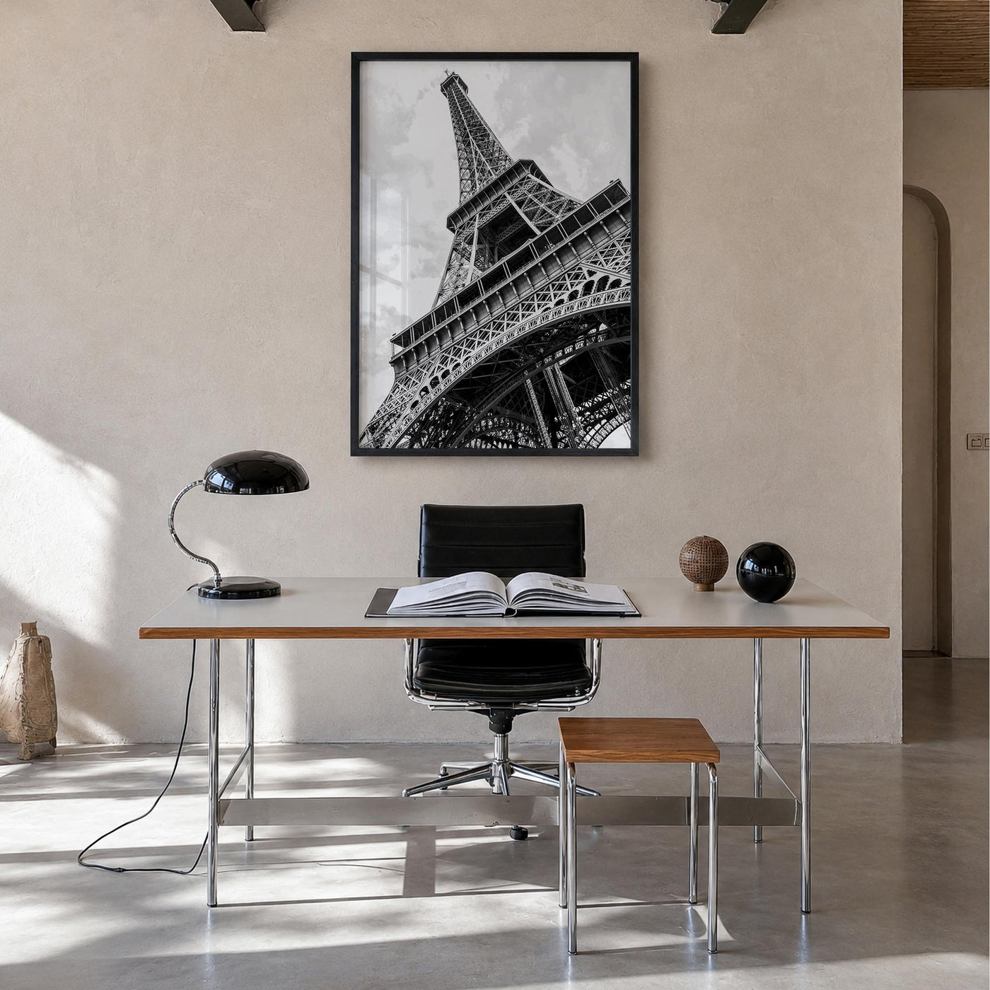 Eiffel Tower black & white photo poster of France – vertical wall art in black wood frame, hanging on wall