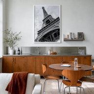 Eiffel Tower black & white photo poster of France – vertical wall art in white wood frame, hanging on wall