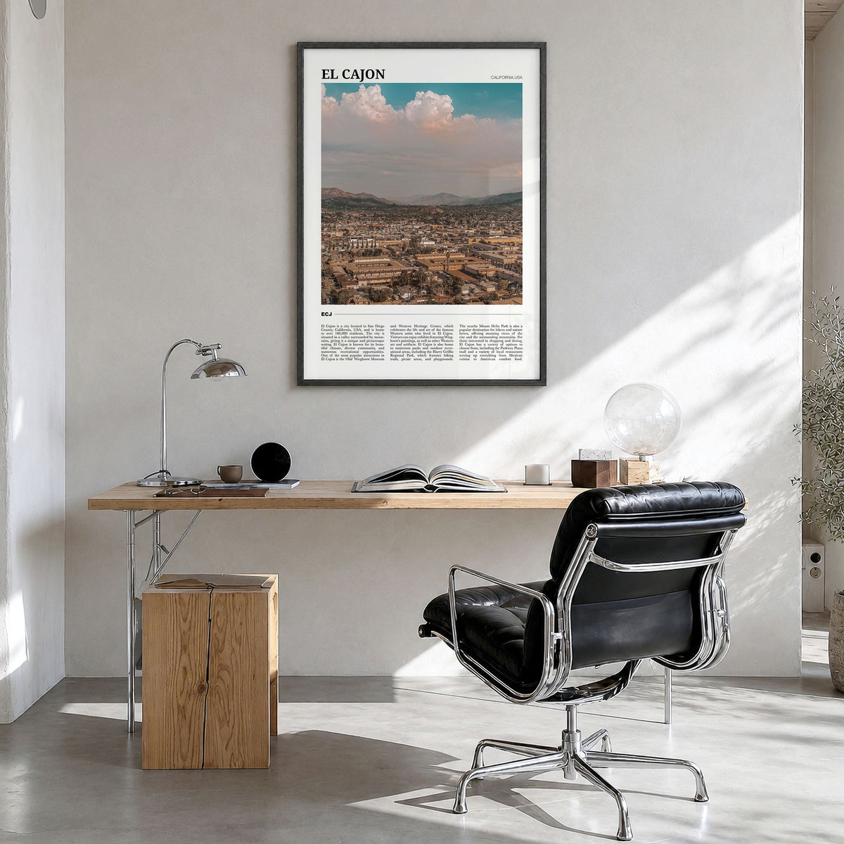 El Cajon Travel Poster in a black wood frame, hanging in a bright home office