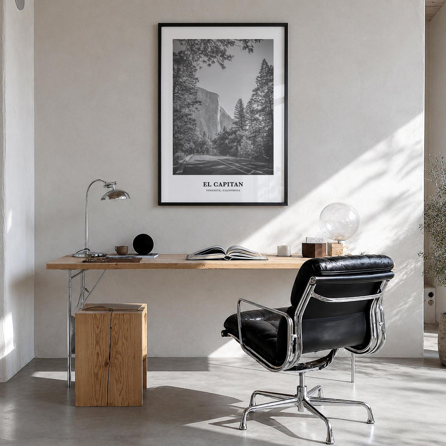 El Capitan black & white classic poster of Yosemite, California – vertical wall art in black wood frame, hanging on wall