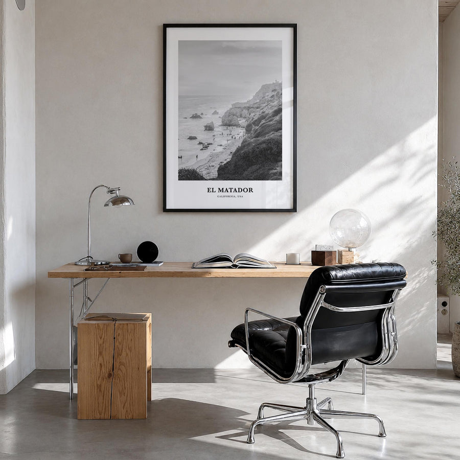 El Matador black & white classic poster of California, USA – vertical wall art in black wood frame, hanging on wall