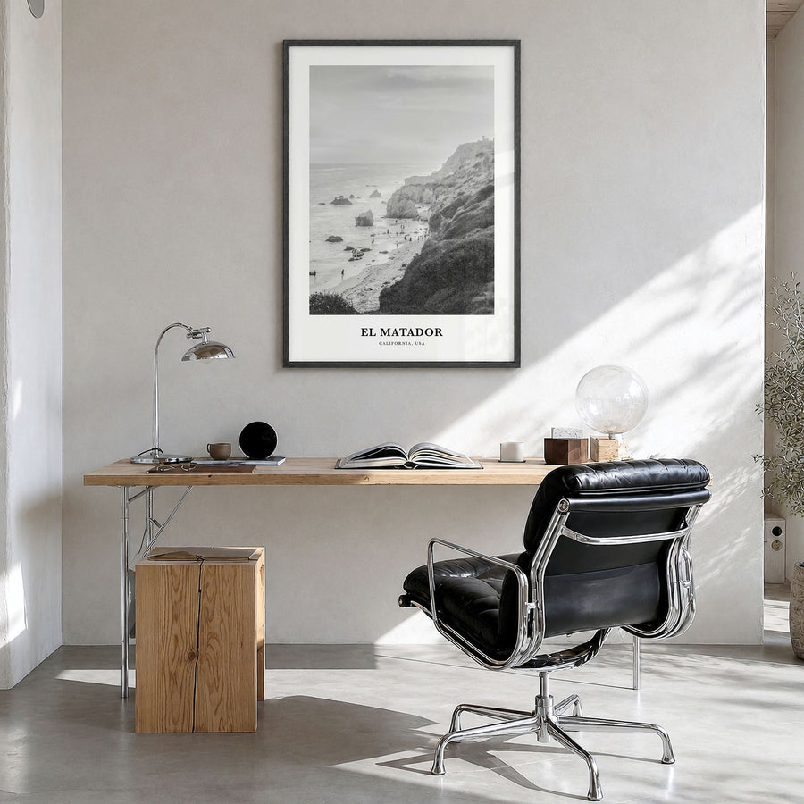 El Matador Classic Poster in a black wood frame, hanging in a bright home office