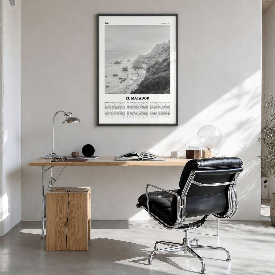 El Matador Newspaper Poster in a black wood frame, hanging in a bright home office
