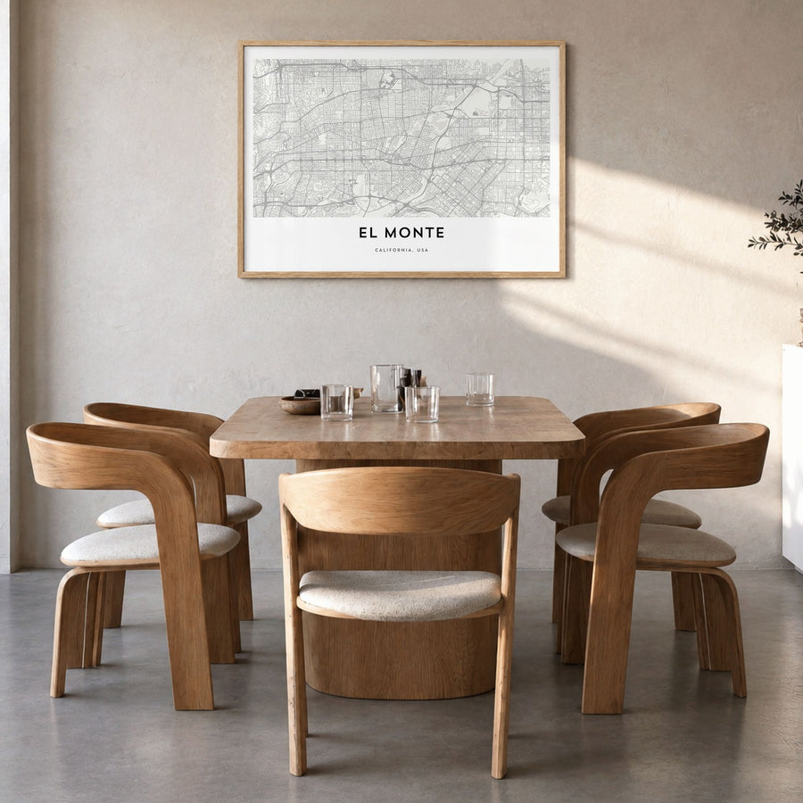 El Monte Map Poster in a natural wood frame, hanging in a dining room