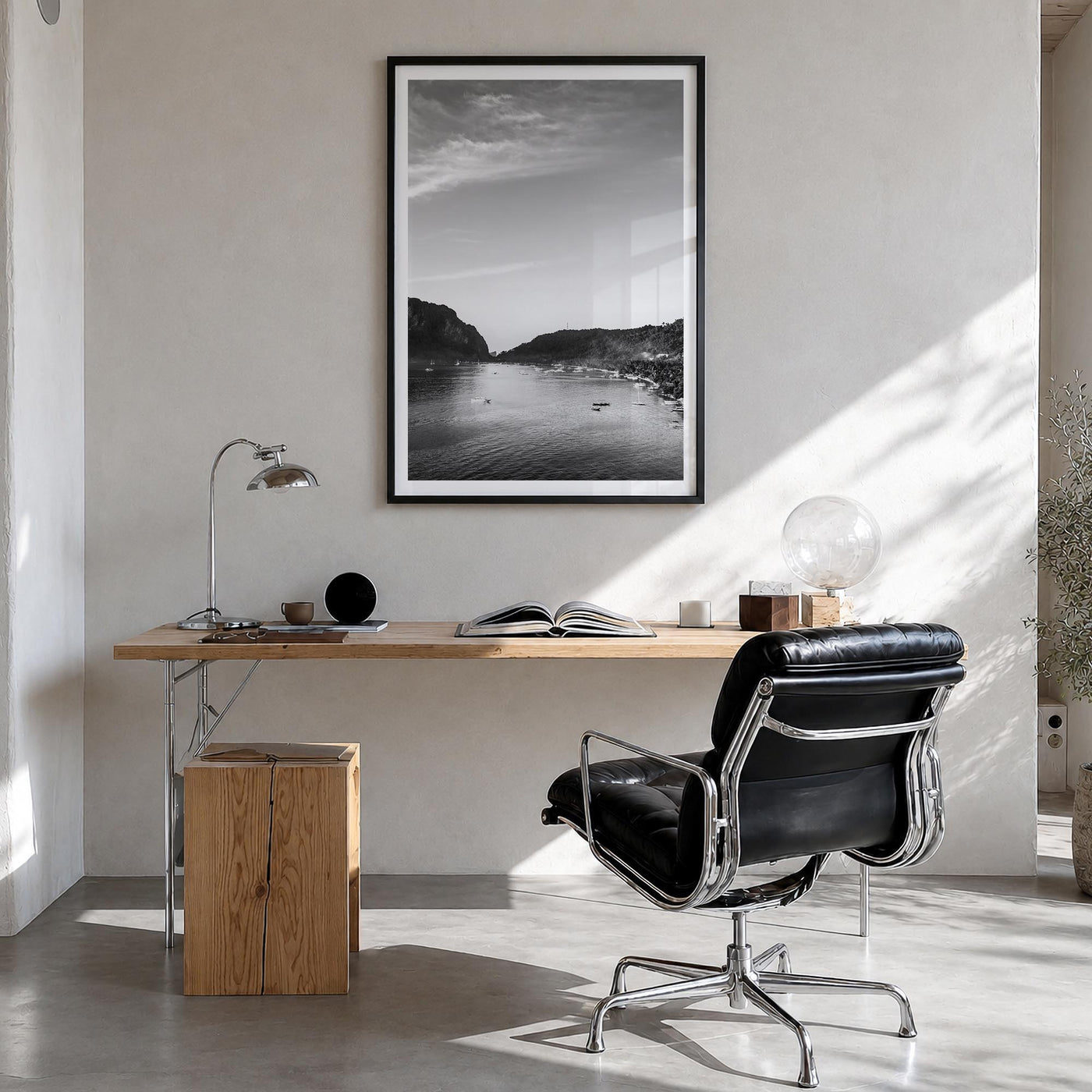 El Nido black & white photo poster of Philippines – vertical wall art in black wood frame with white border, hanging on wall