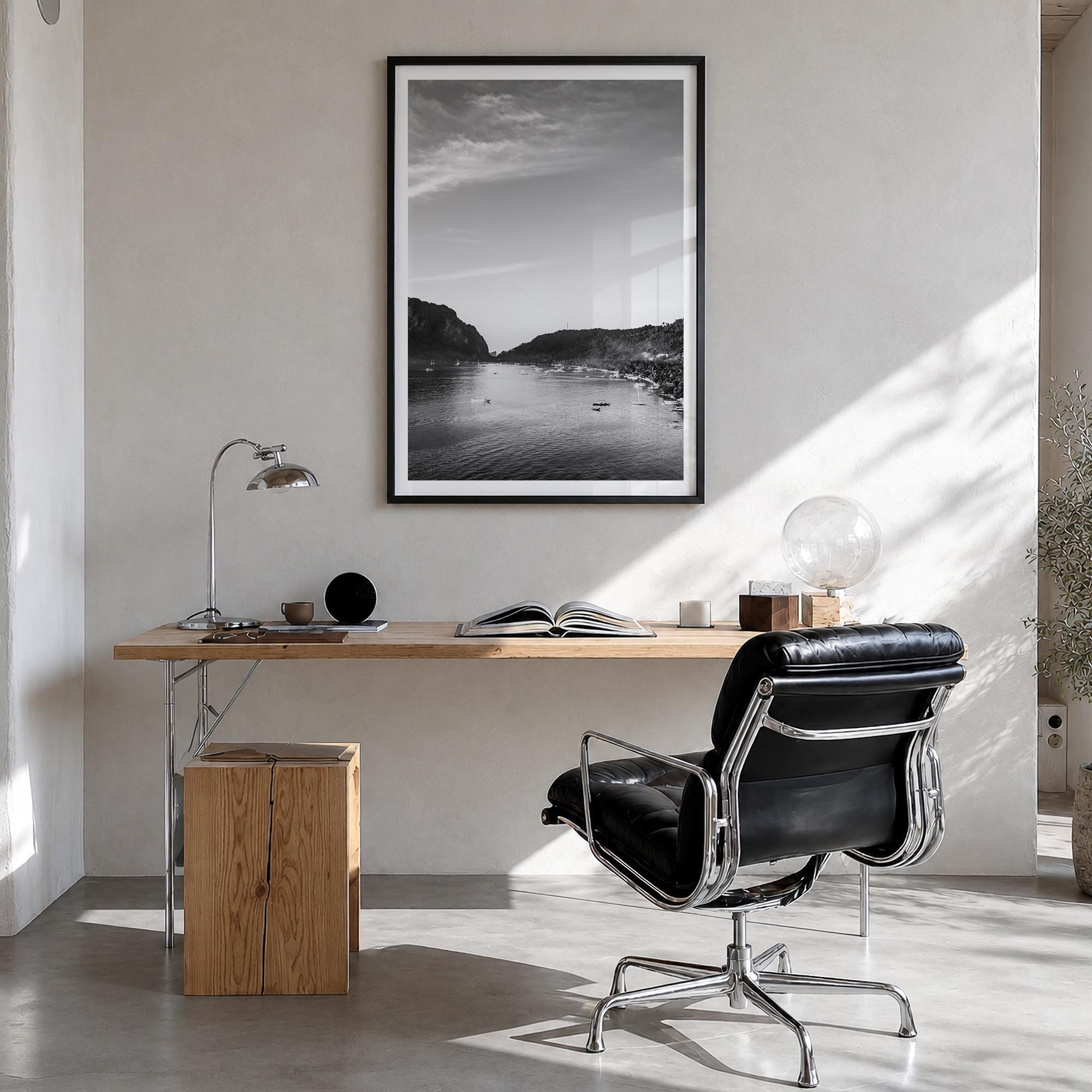 El Nido black & white photo poster of Philippines – vertical wall art in black wood frame with white border, hanging on wall