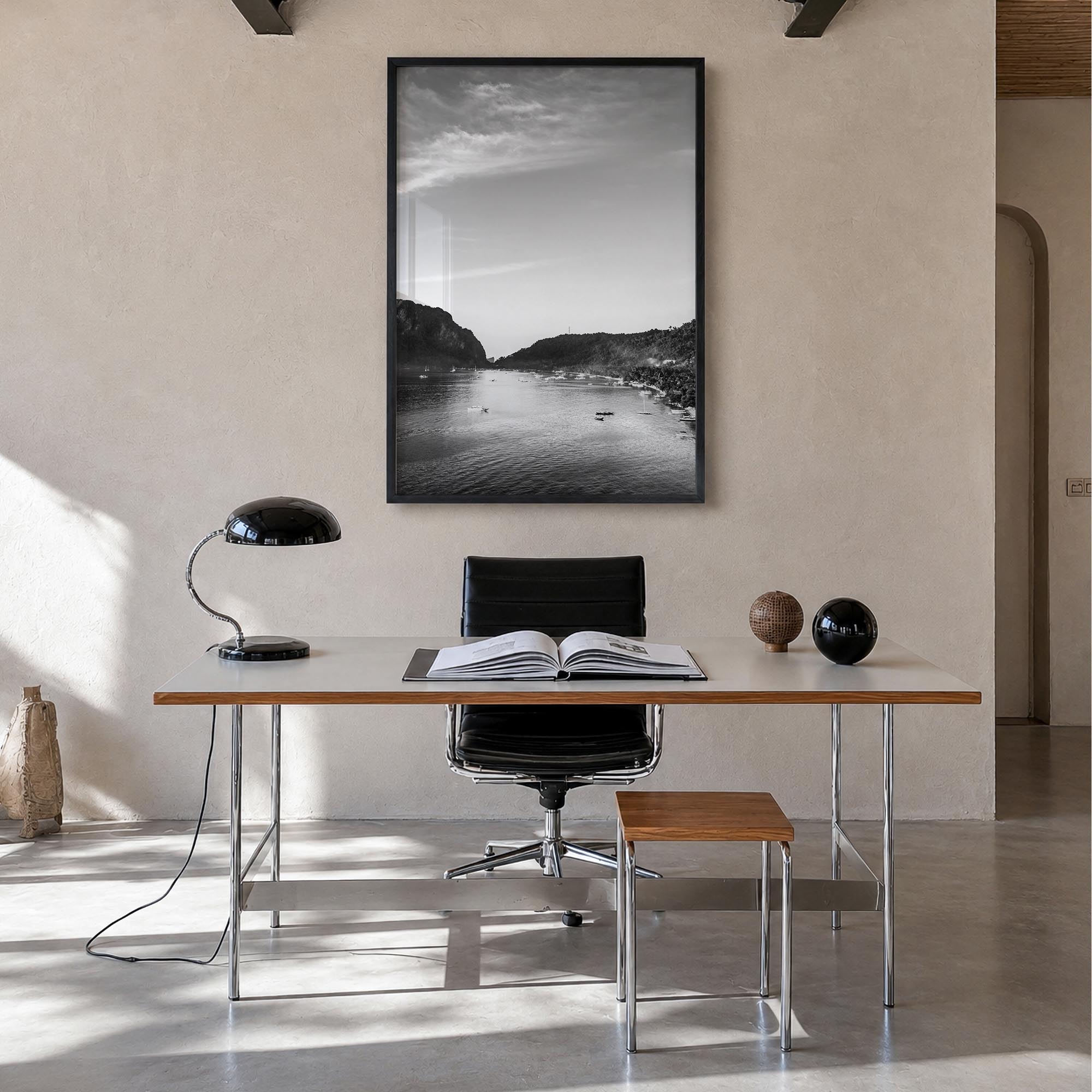 El Nido black & white photo poster of Philippines – vertical wall art in black wood frame, hanging on wall