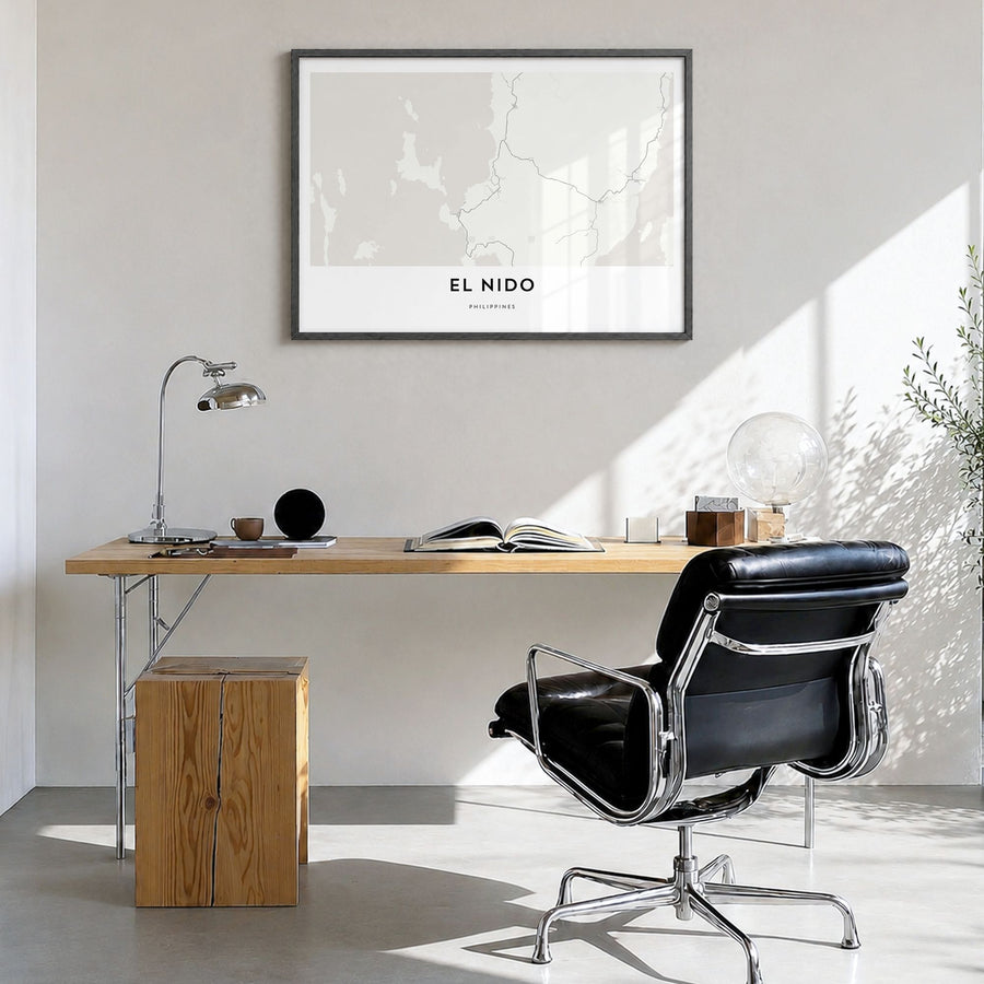 El Nido Map Poster in a black wood frame, hanging in a bright home office