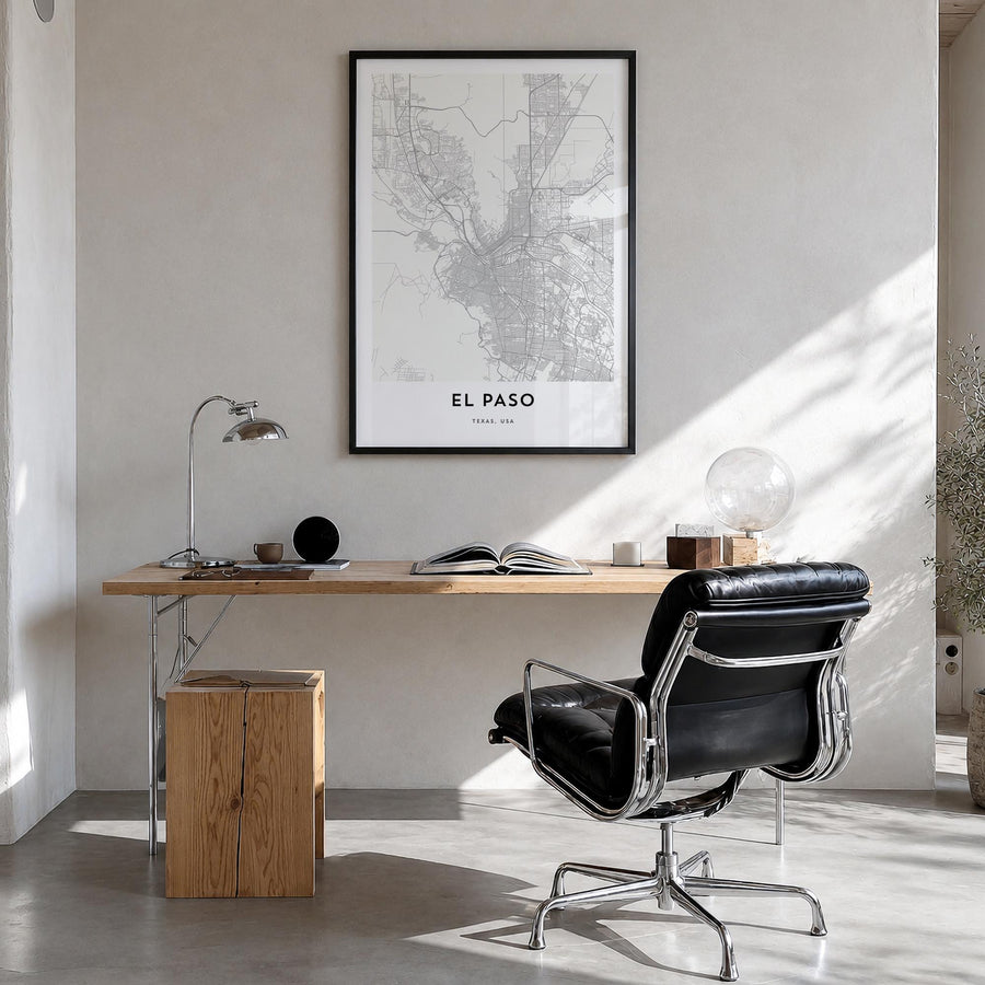 El Paso black & white map poster of Texas, USA – vertical wall art in black wood frame, hanging on wall