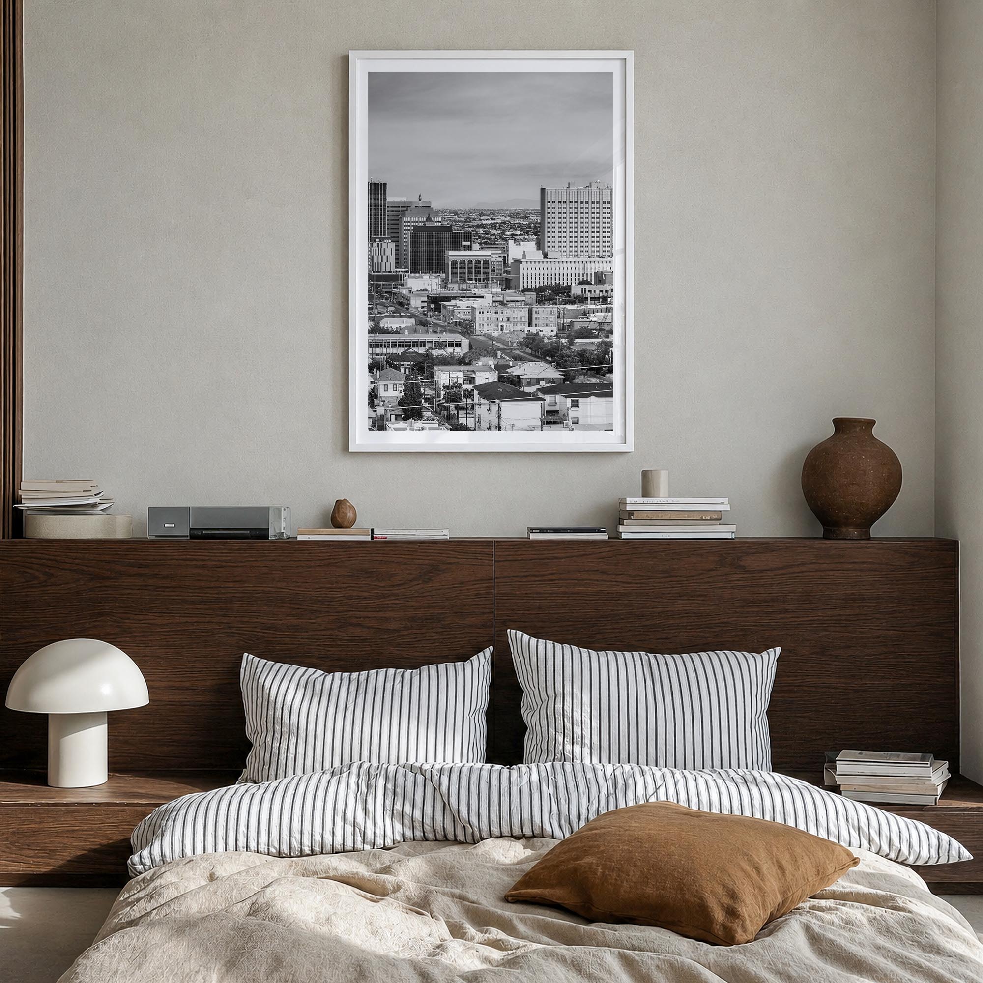 El Paso black & white photo poster of Texas, USA – vertical wall art in white wood frame with white border, hanging on wall