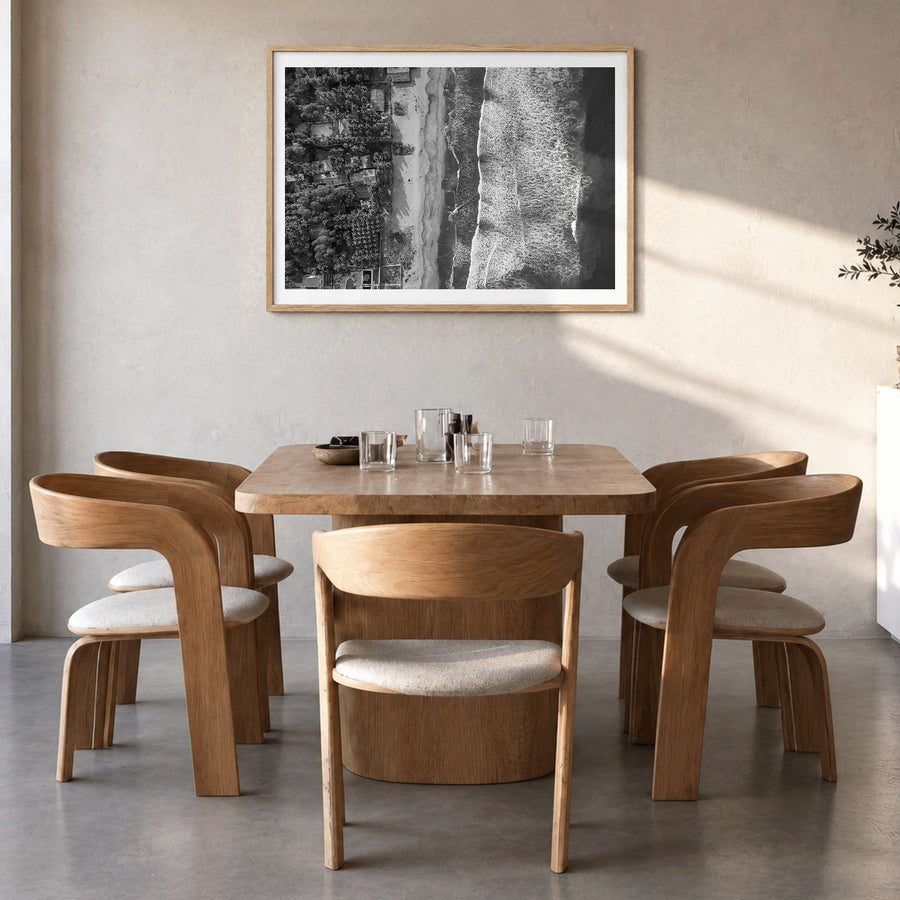 El Salvador Photo Poster in a natural wood frame, hanging in a dining room, white border