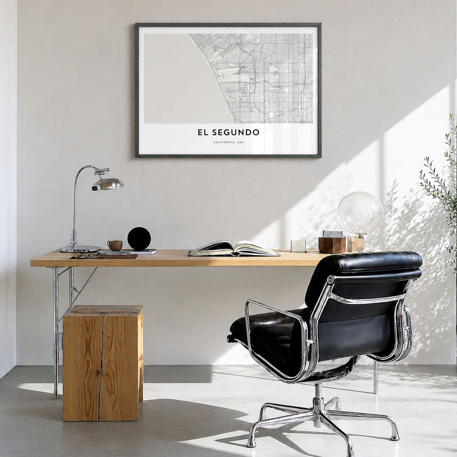 El Segundo Map Poster in a black wood frame, hanging in a bright home office