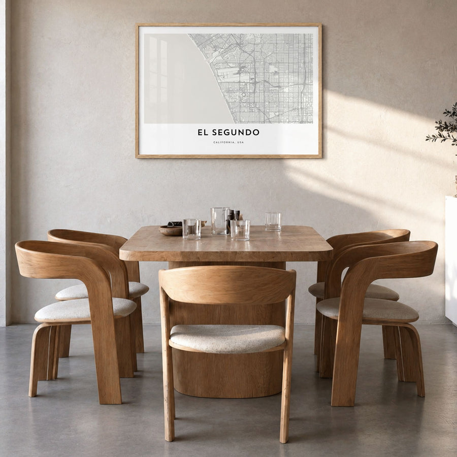 El Segundo Map Poster in a natural wood frame, hanging in a dining room
