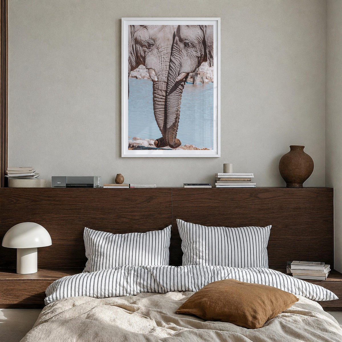 Elephant Couple colorful photo poster – vertical wall art in white wood frame with white border, hanging on wall