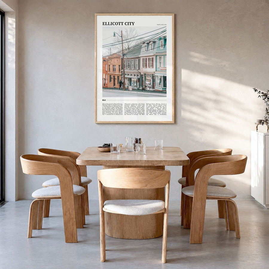 Ellicott City Travel Poster in a natural wood frame, hanging in a dining room