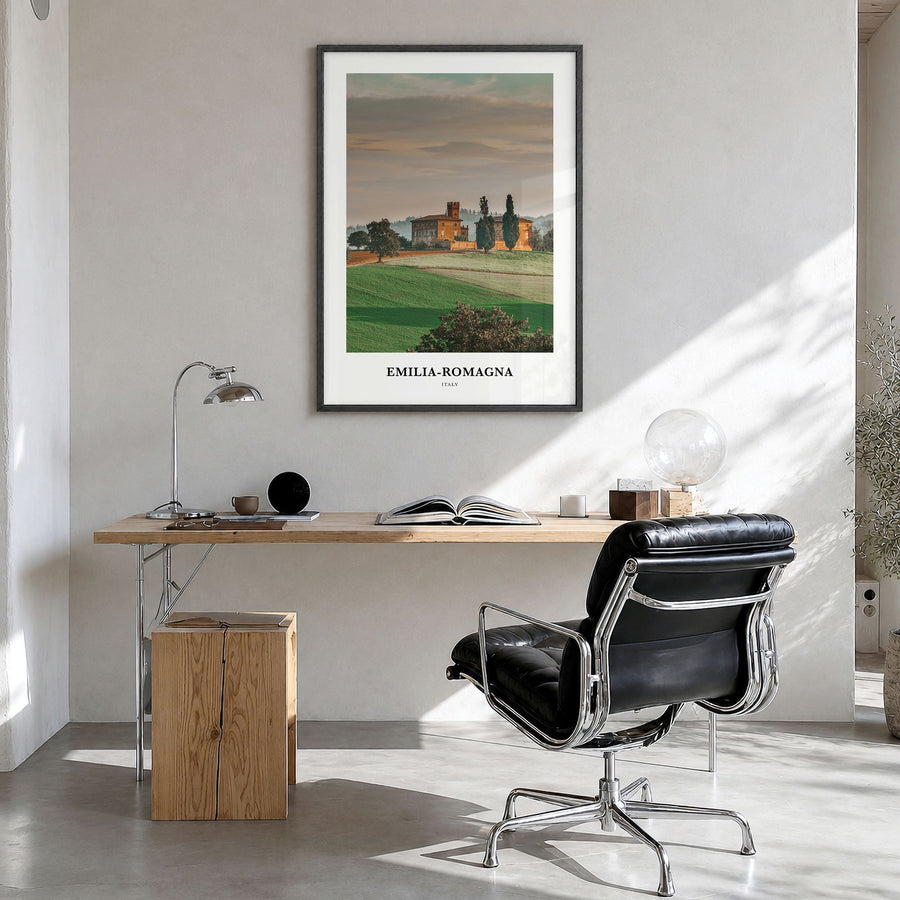Emilia-Romagna Classic Poster in a black wood frame, hanging in a bright home office