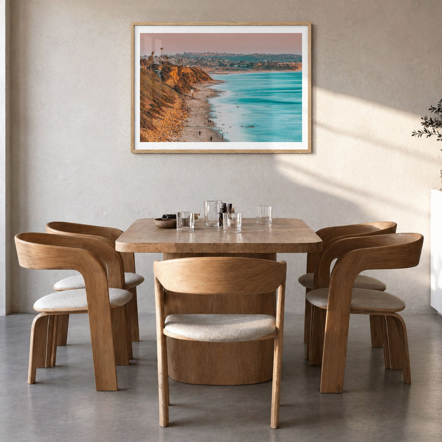 Encinitas Photo Poster in a natural wood frame, hanging in a dining room, white border