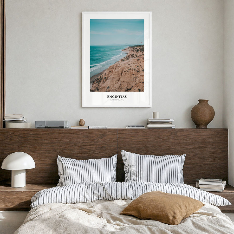 Encinitas Classic Poster in a white wood frame, hanging in a bedroom
