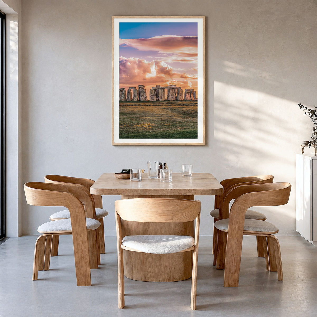 England Photo Poster in a natural wood frame, hanging in a dining room, white border