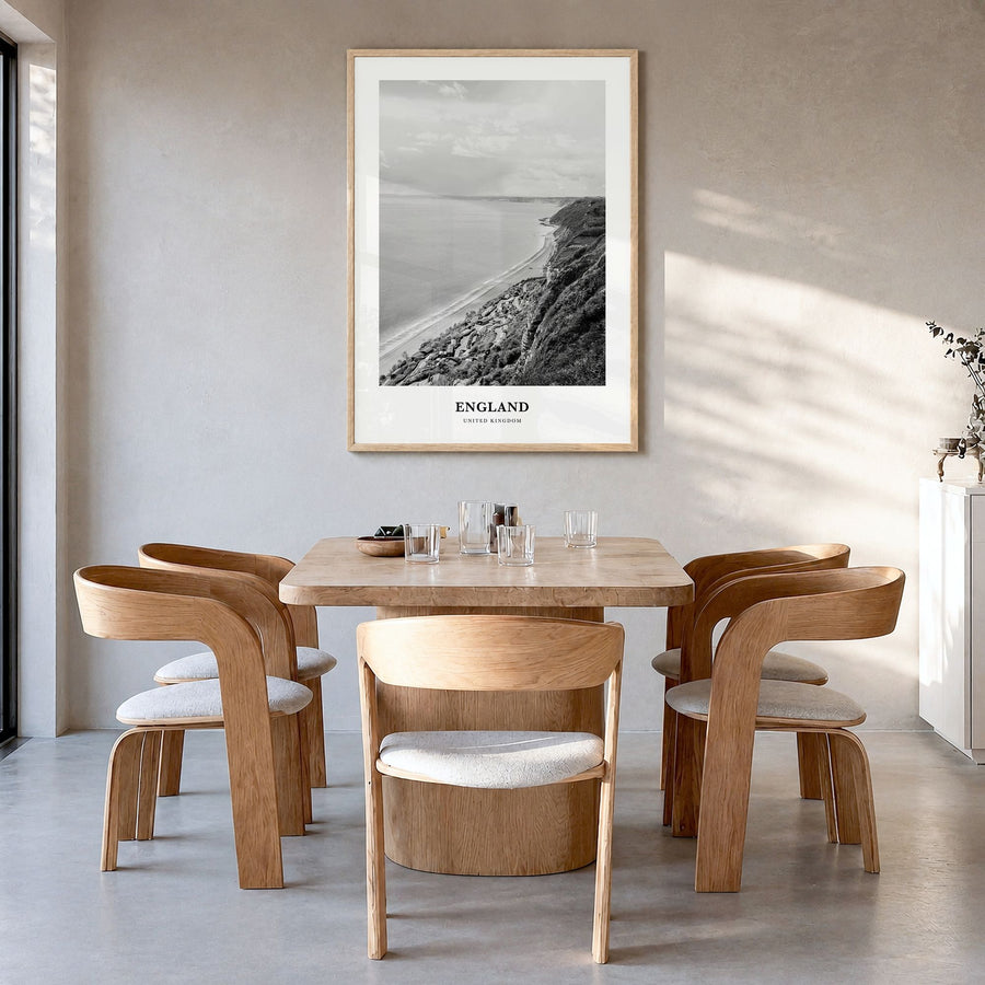 England Classic Poster in a natural wood frame, hanging in a dining room