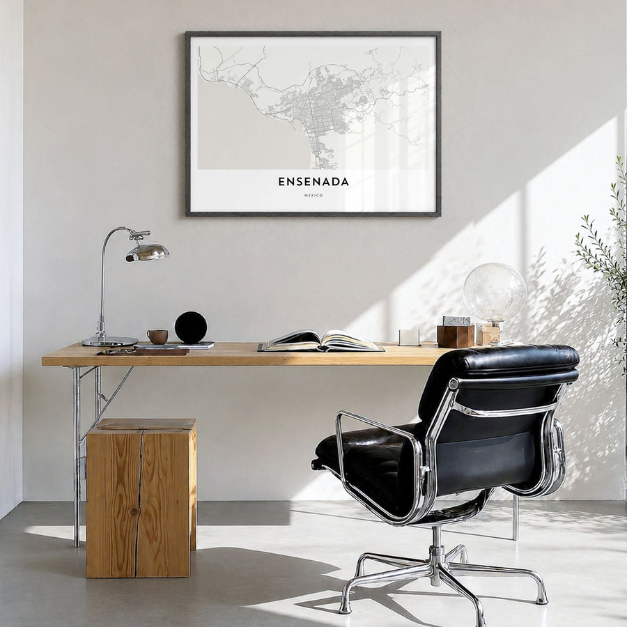 Ensenada Map Poster in a black wood frame, hanging in a bright home office