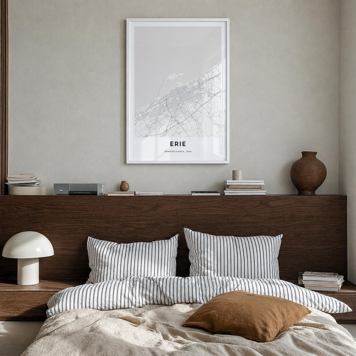Erie black & white map poster of Pennsylvania, USA – vertical wall art in white wood frame, hanging on wall