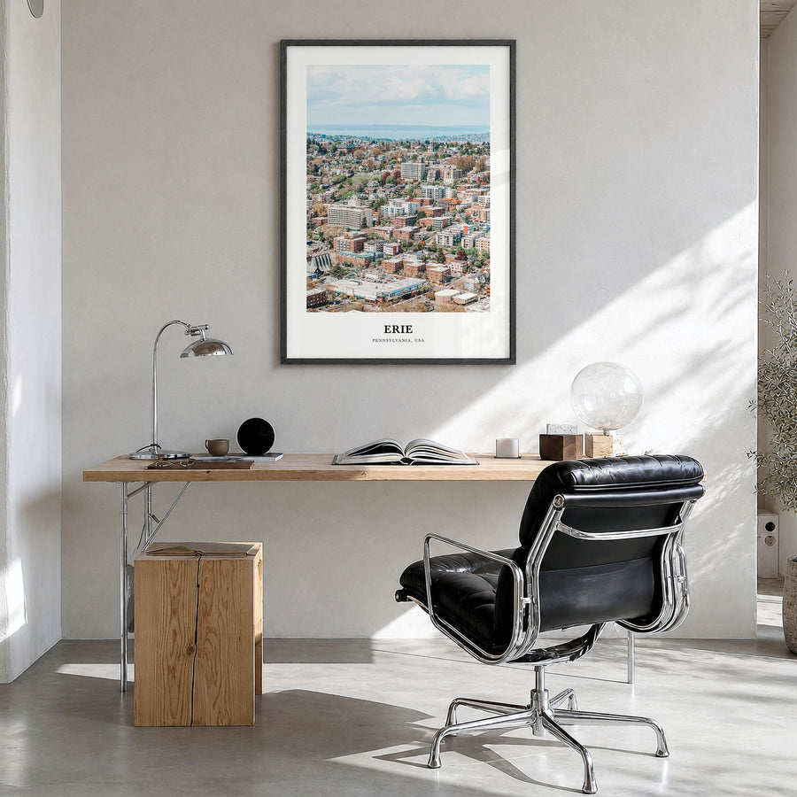 Erie Classic Poster in a black wood frame, hanging in a bright home office