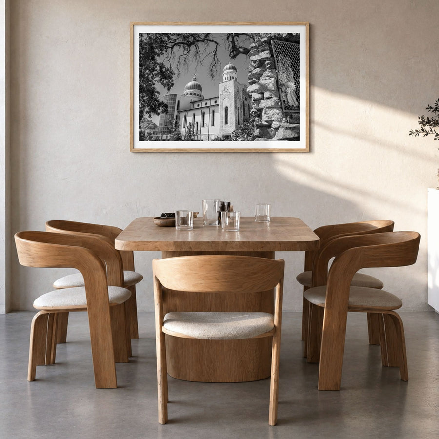 Eritrea Photo Poster in a natural wood frame, hanging in a dining room, white border