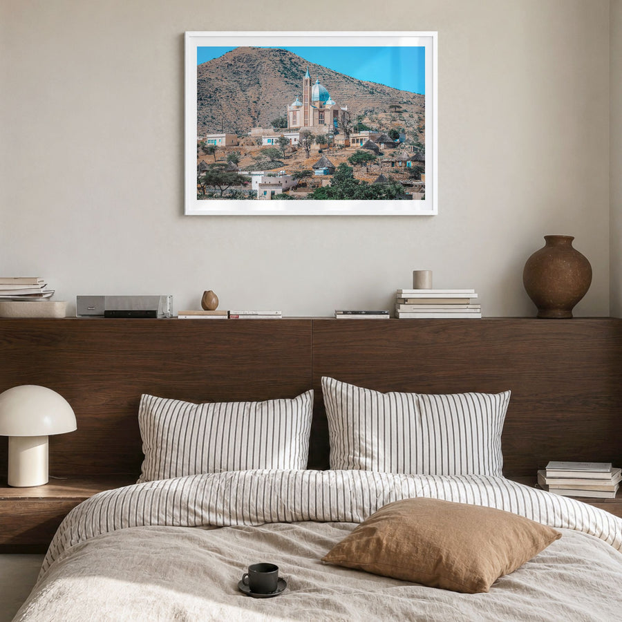 Eritrea Photo Poster in a white wood frame, hanging in a bedroom, white border