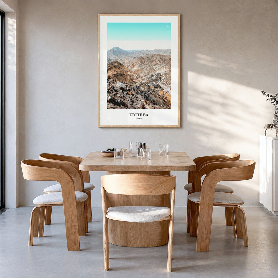 Eritrea Classic Poster in a natural wood frame, hanging in a dining room