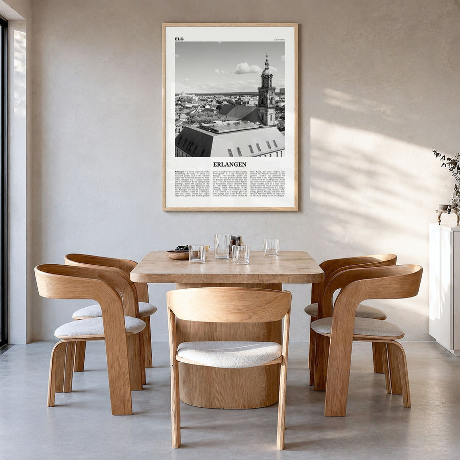 Erlangen Newspaper Poster in a natural wood frame, hanging in a dining room