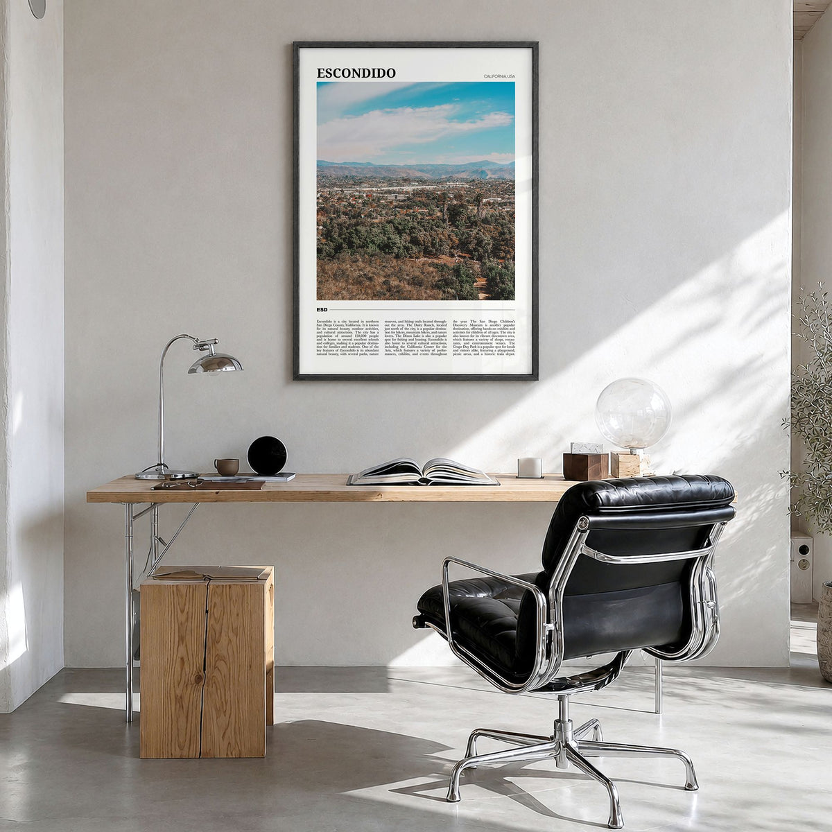 Escondido Travel Poster in a black wood frame, hanging in a bright home office