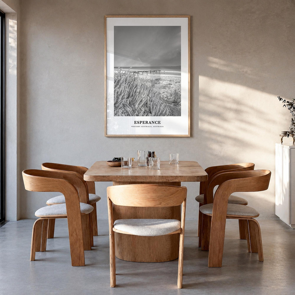 Esperance black & white classic poster of Australia – vertical wall art in natural wood frame, hanging on wall