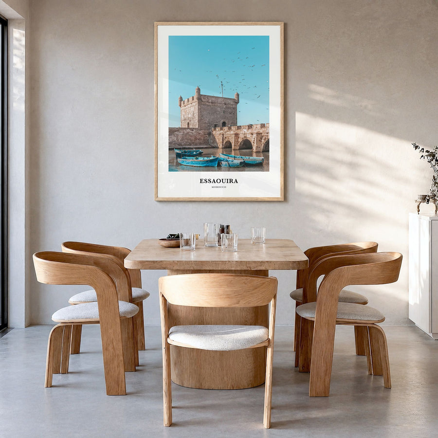 Essaouira Classic No 1 Poster in a natural wood frame, hanging in a dining room