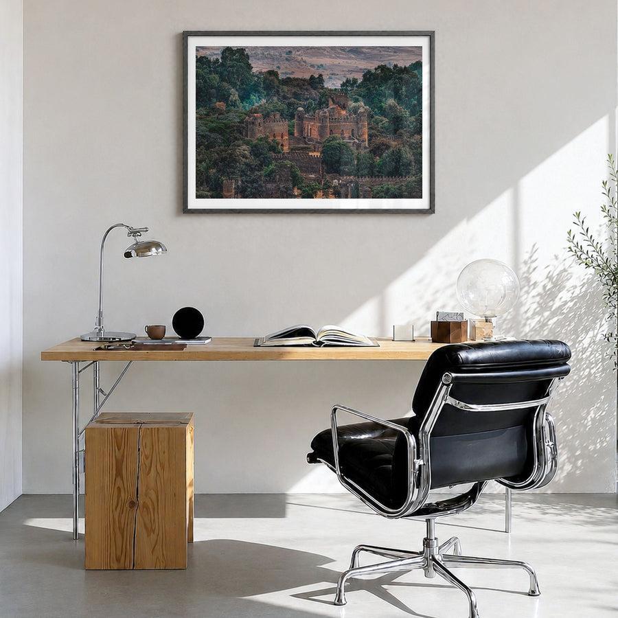 Ethiopia Photo Poster in a black wood frame, hanging in a bright home office, white border