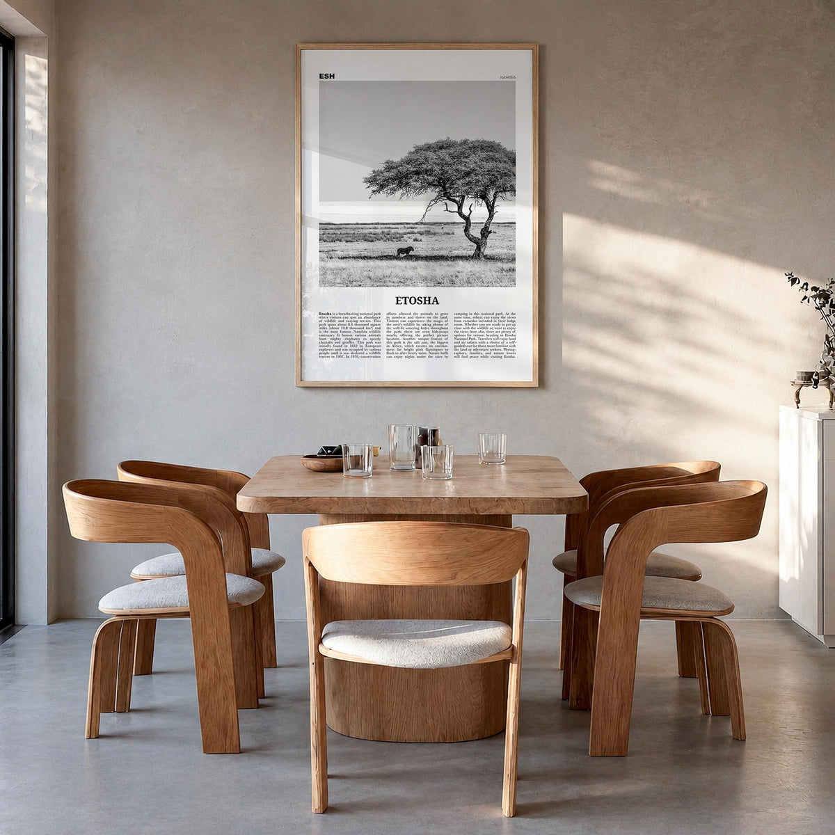 Etosha National Park black & white newspaper poster of Namibia – vertical wall art in natural wood frame, hanging on wall