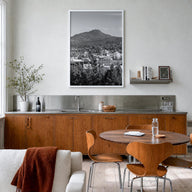 Eugene black & white photo poster of Oregon, USA – vertical wall art in white wood frame, hanging on wall