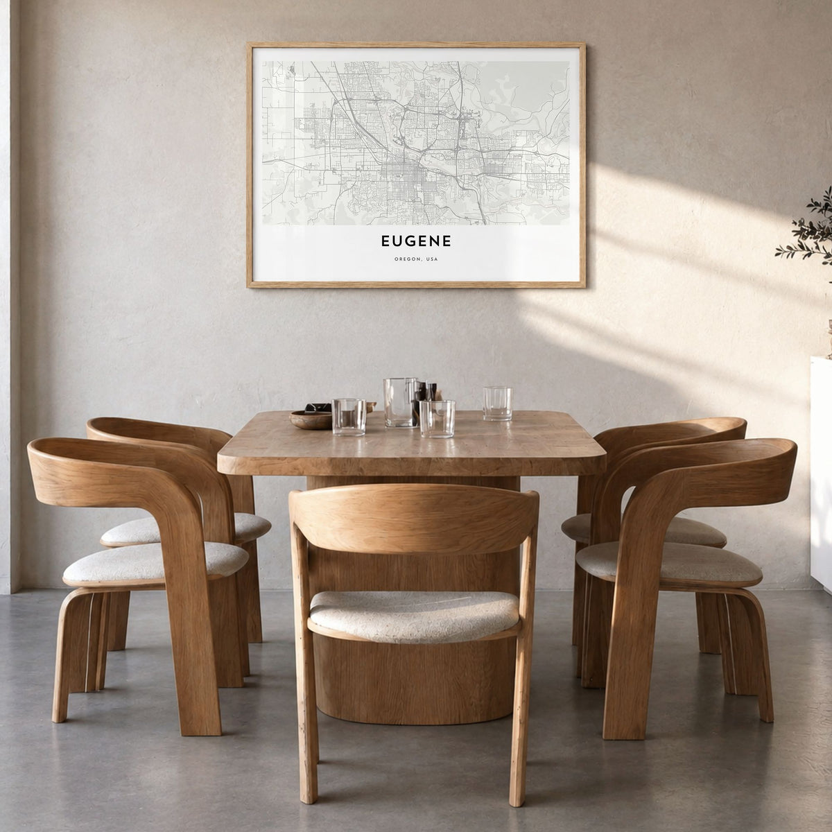 Eugene Map Poster in a natural wood frame, hanging in a dining room