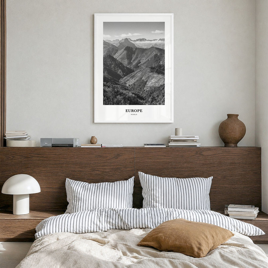 Europe Classic Poster in a white wood frame, hanging in a bedroom