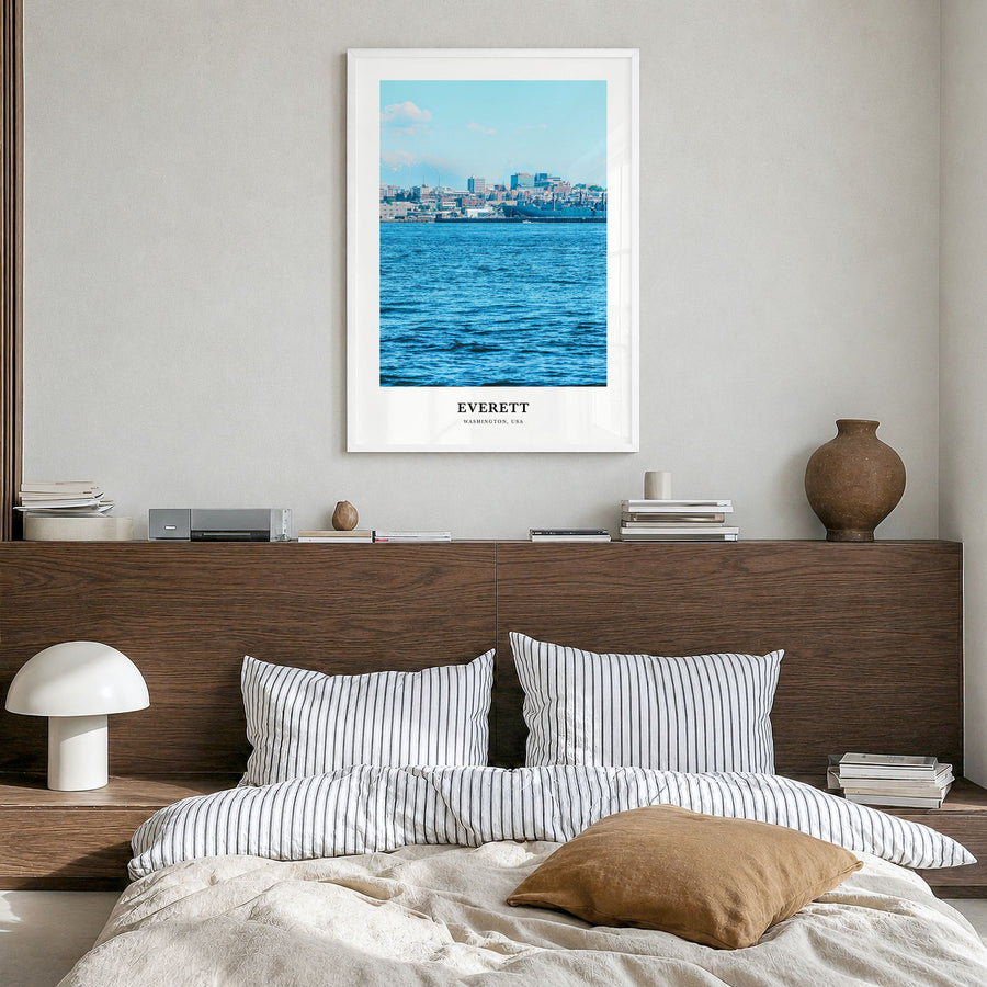 Everett Classic Poster in a white wood frame, hanging in a bedroom