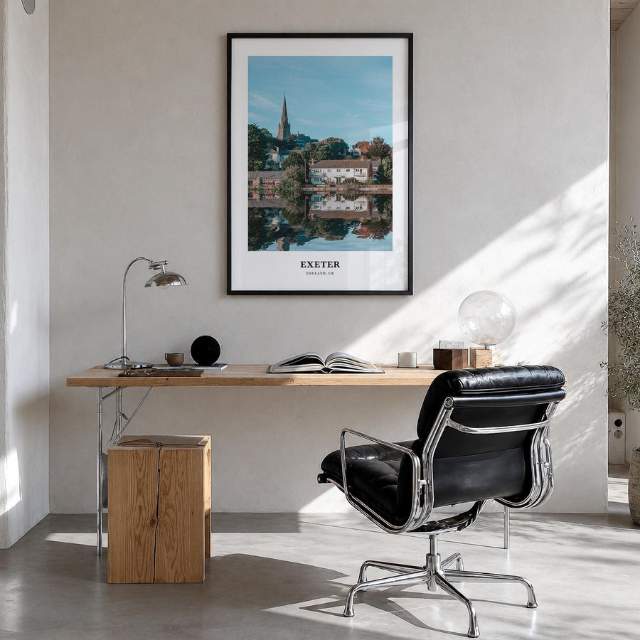 Exeter colorful classic poster of England, UK – vertical wall art in black wood frame, hanging on wall